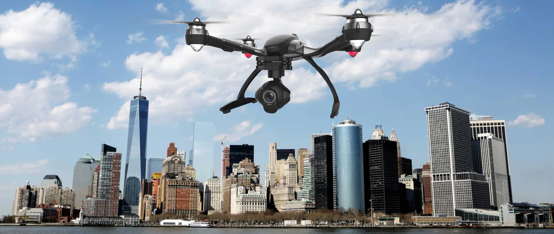 Yuneec Q500 drone in flight above a city skyline